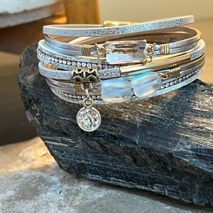 Vegan leather and glass bracelet.